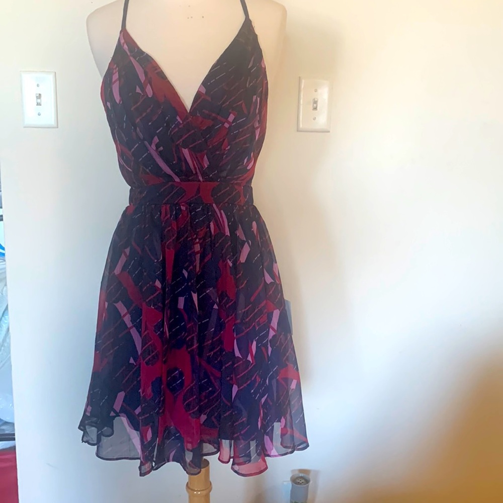 Multicolored Mini Dress. Low cut with front snap.
